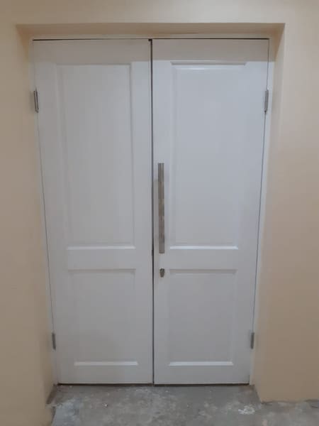 A white double door, installed