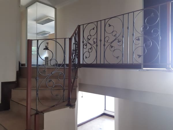 A steel hand railing, made and installed